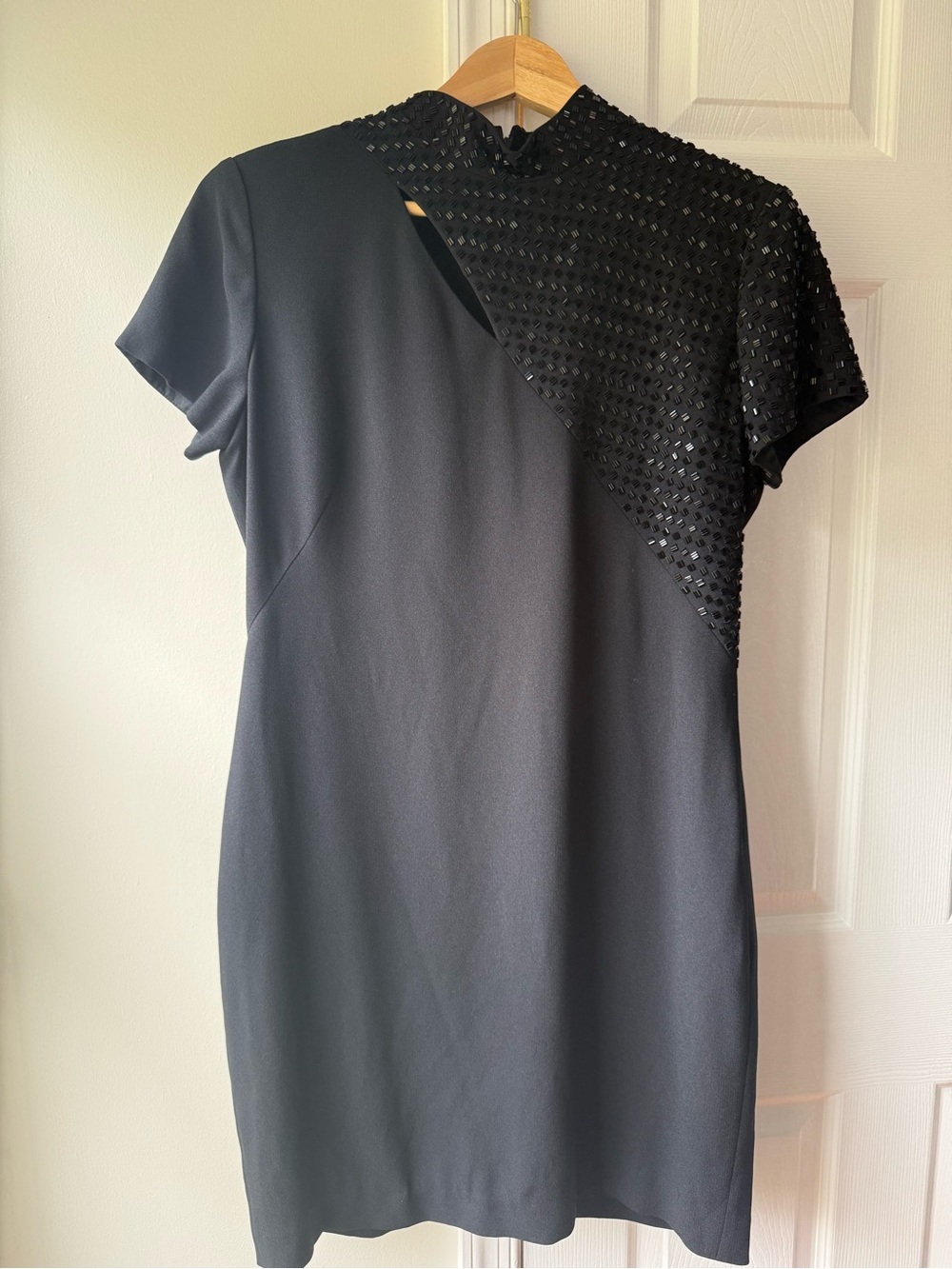 Vintage Liz Claiborne black dress with beaded panel. Cut out detail. Size  14 P
